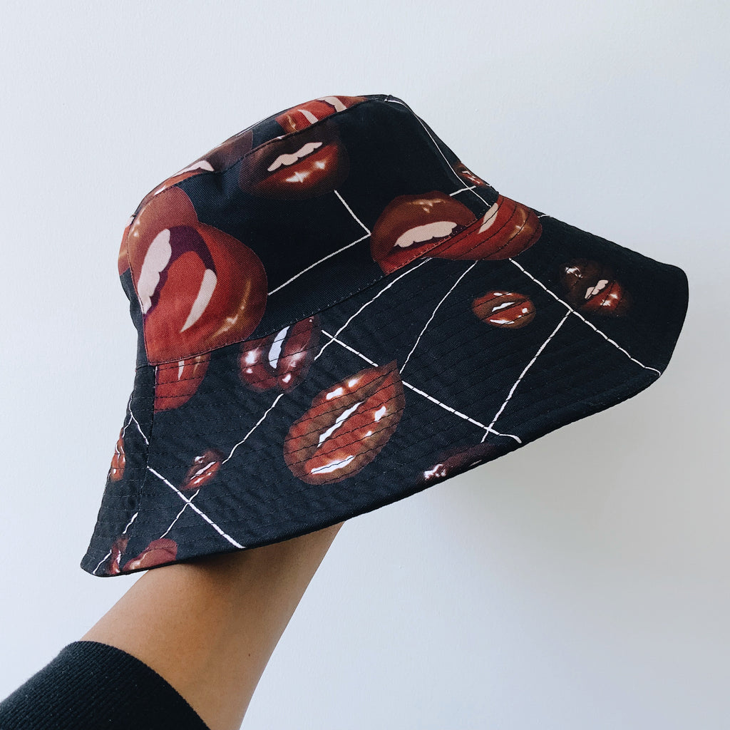 Hey Bighead! I am obsessed with this latest design and I know you will be too! My BACK2BLACK bucket hat is designed with a 12cm brim, perfect for protecting that beautiful face from the sun.
